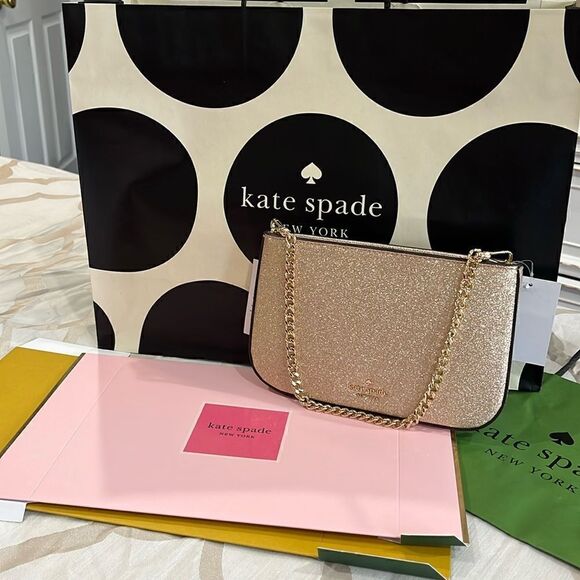kate spade Handbags - Brand new gold clutch
